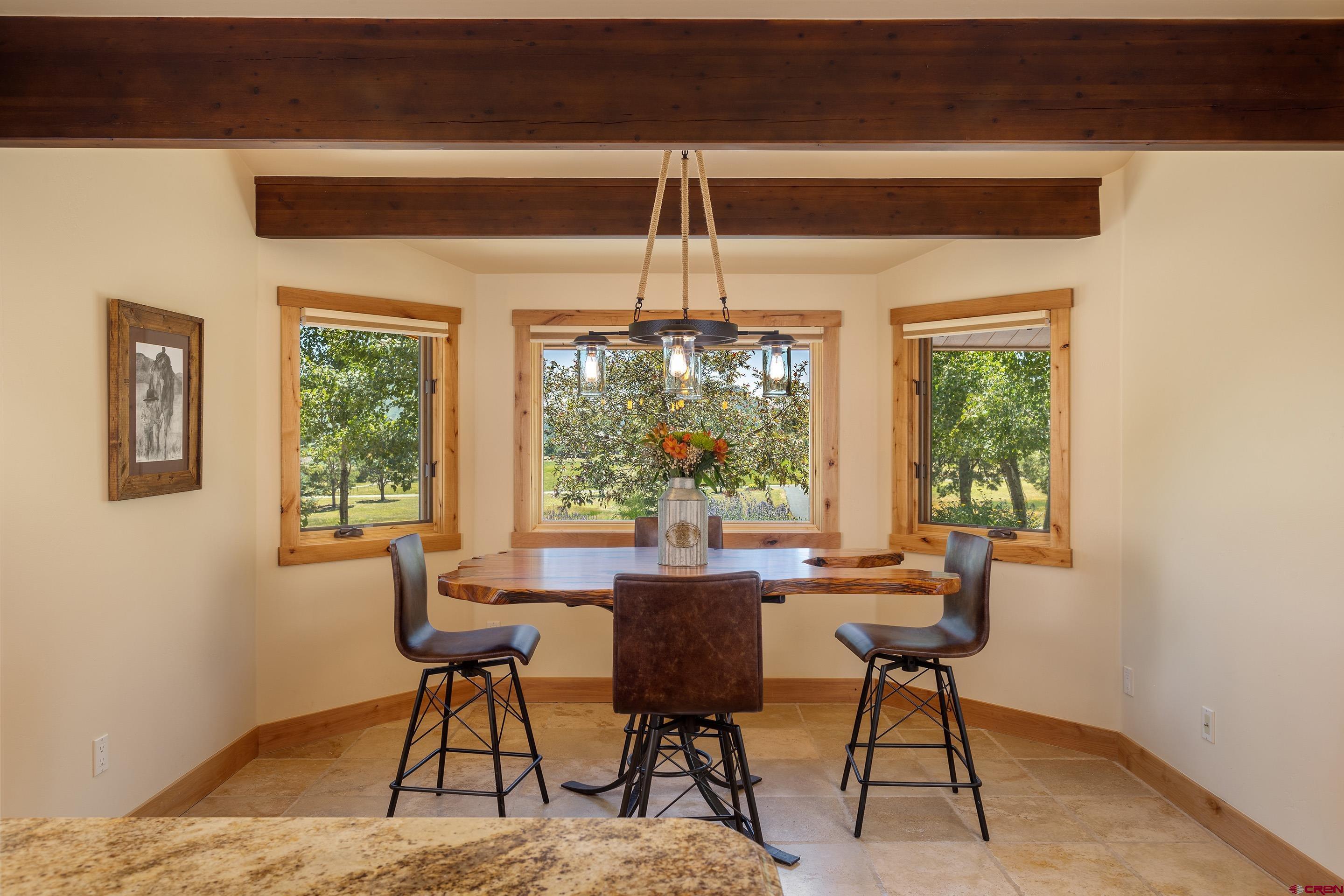 378 Colonial Drive Hesperus, CO 81326 - Photo 14 of 34 a dining room with furniture and window