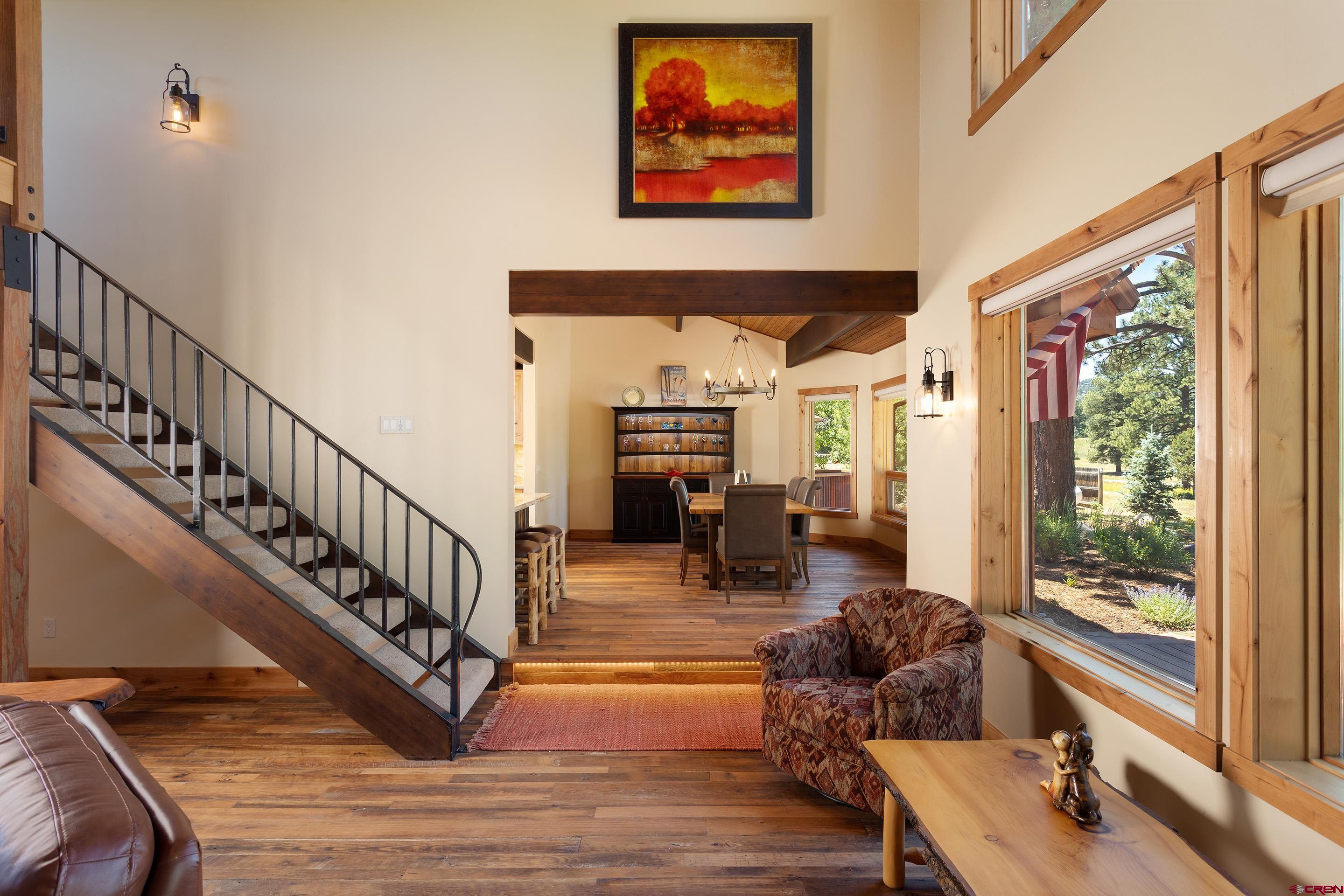 378 Colonial Drive Hesperus, CO 81326 - Photo 17 of 34 a living room with furniture and a fireplace