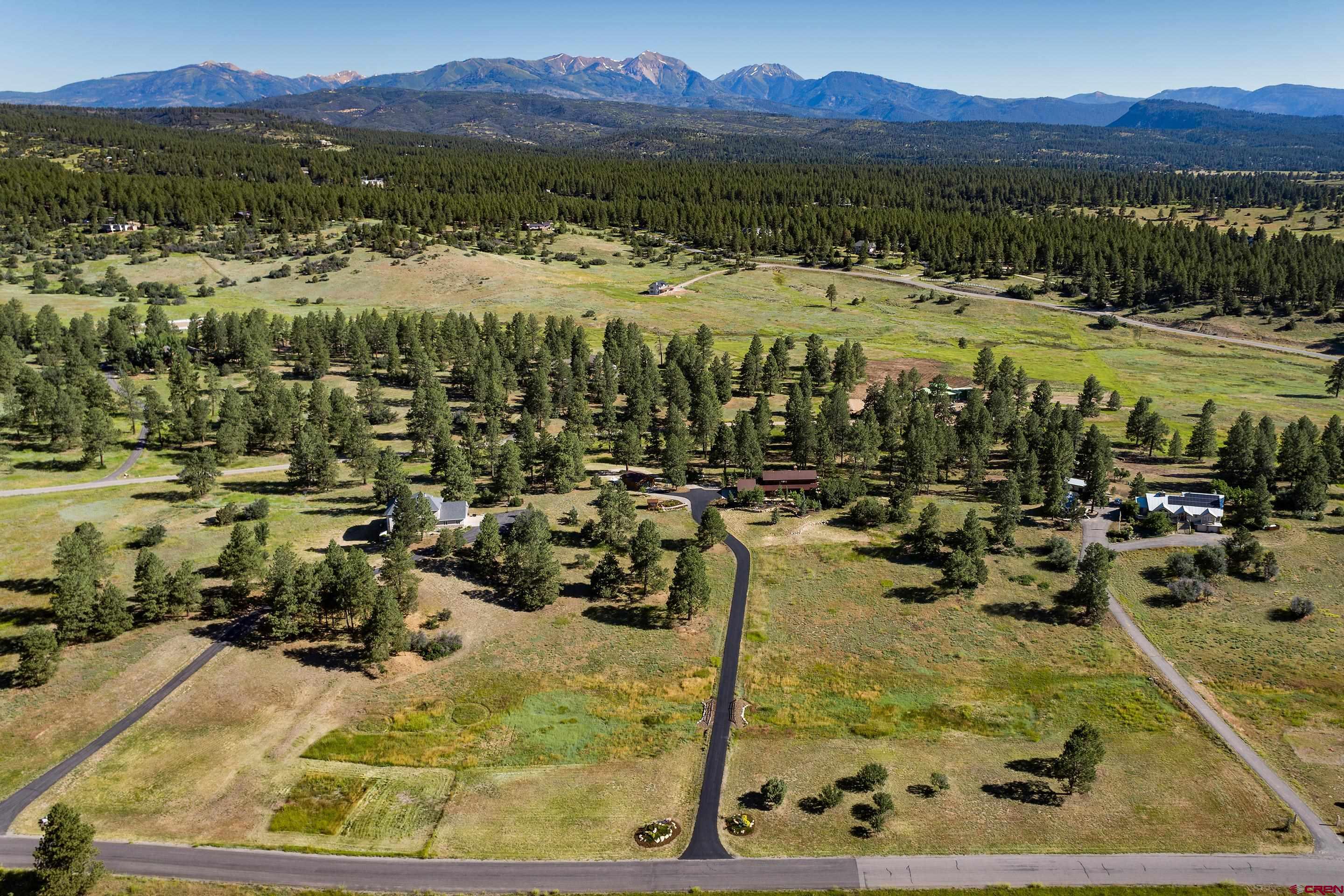 378 Colonial Drive Hesperus, CO 81326 - Photo 2 of 34 a view of a swimming pool with a lake