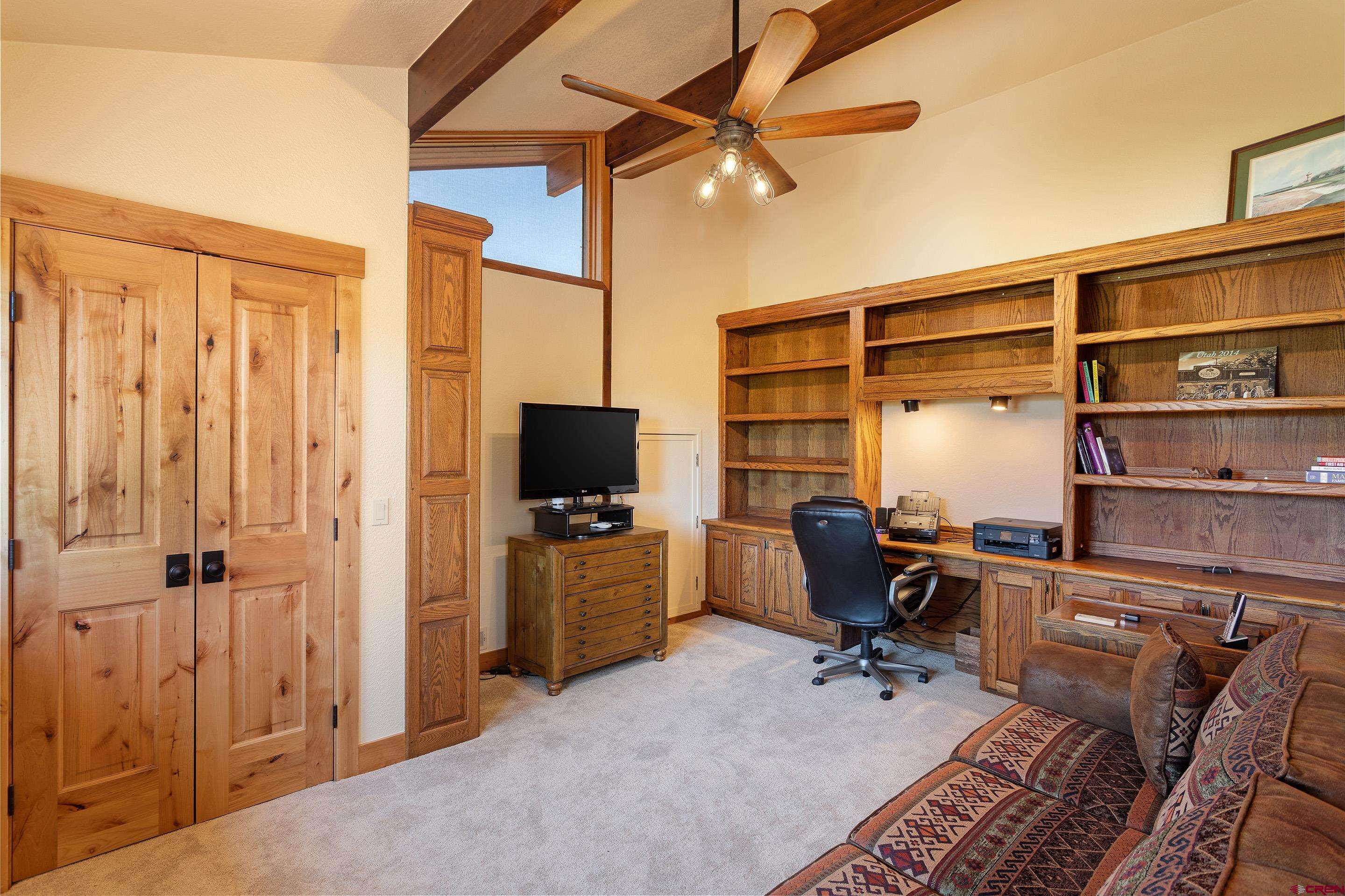 378 Colonial Drive Hesperus, CO 81326 - Photo 26 of 34 a view of a livingroom with workspace and a window