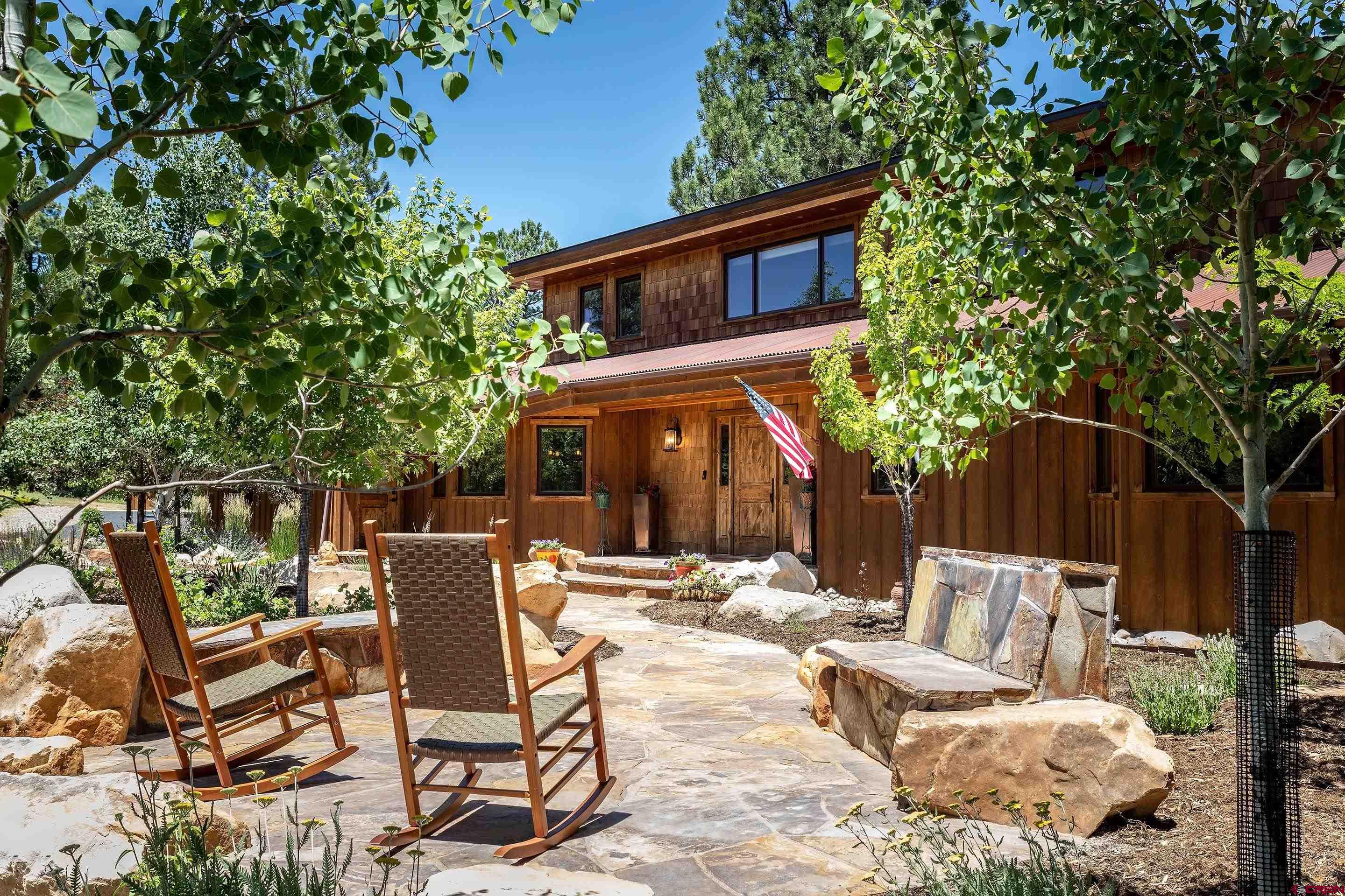 378 Colonial Drive Hesperus, CO 81326 - Photo 6 of 34 a view of backyard with outdoor seating and plants