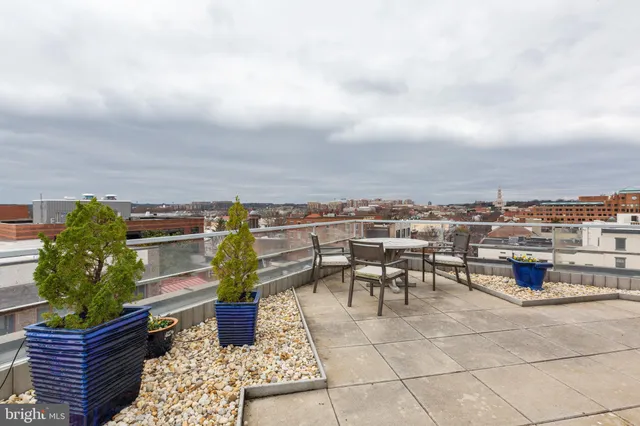 a view of a terrace with furniture