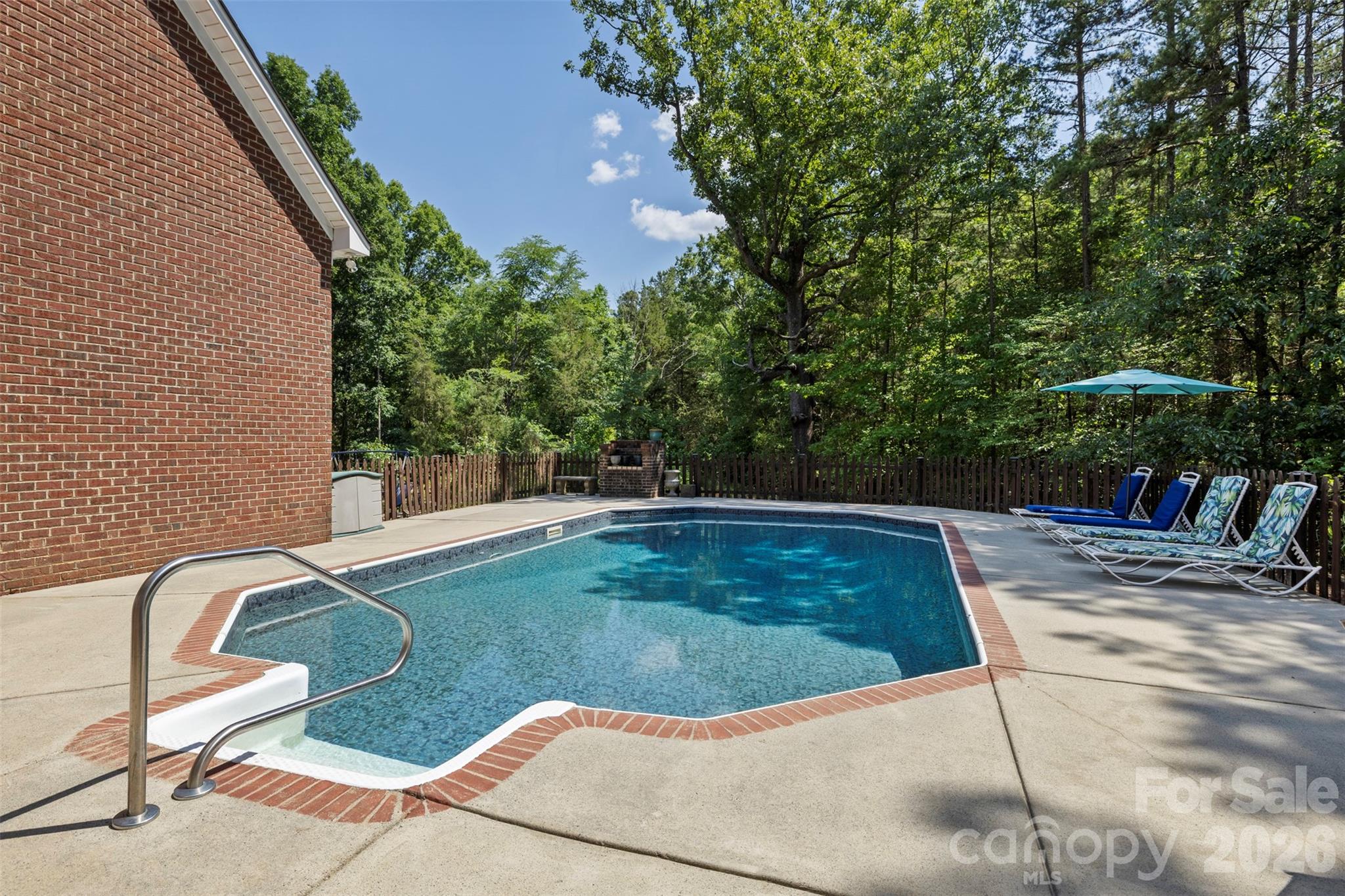 710 Sleepy Hollow Road Midland, NC 28107 - Photo 24 of 29 a view of a swimming pool with a patio