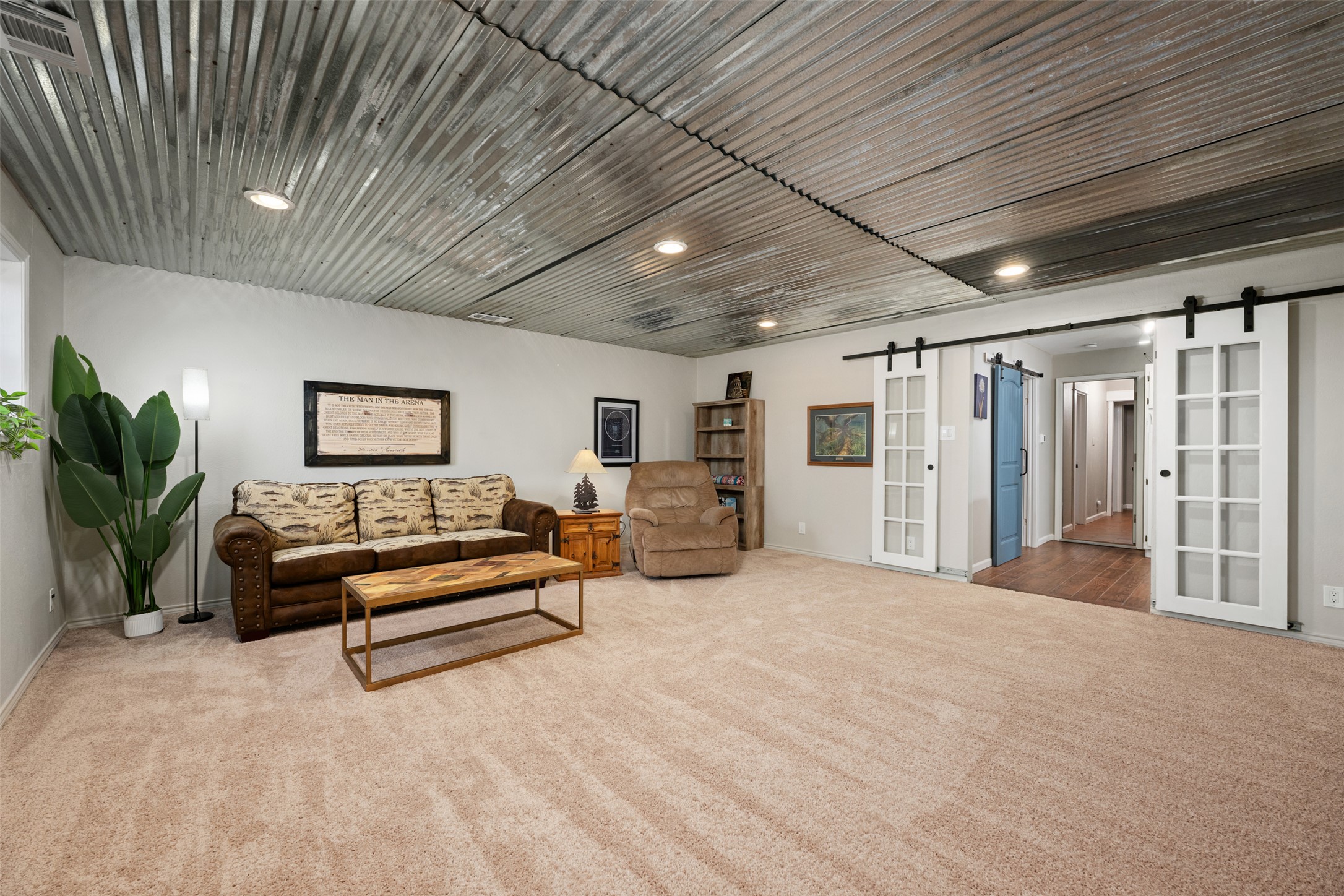 6501 County Road 239 Jarrell, TX 76537 - Photo 22 of 40 2nd Living area featuring French doors and new light carpet