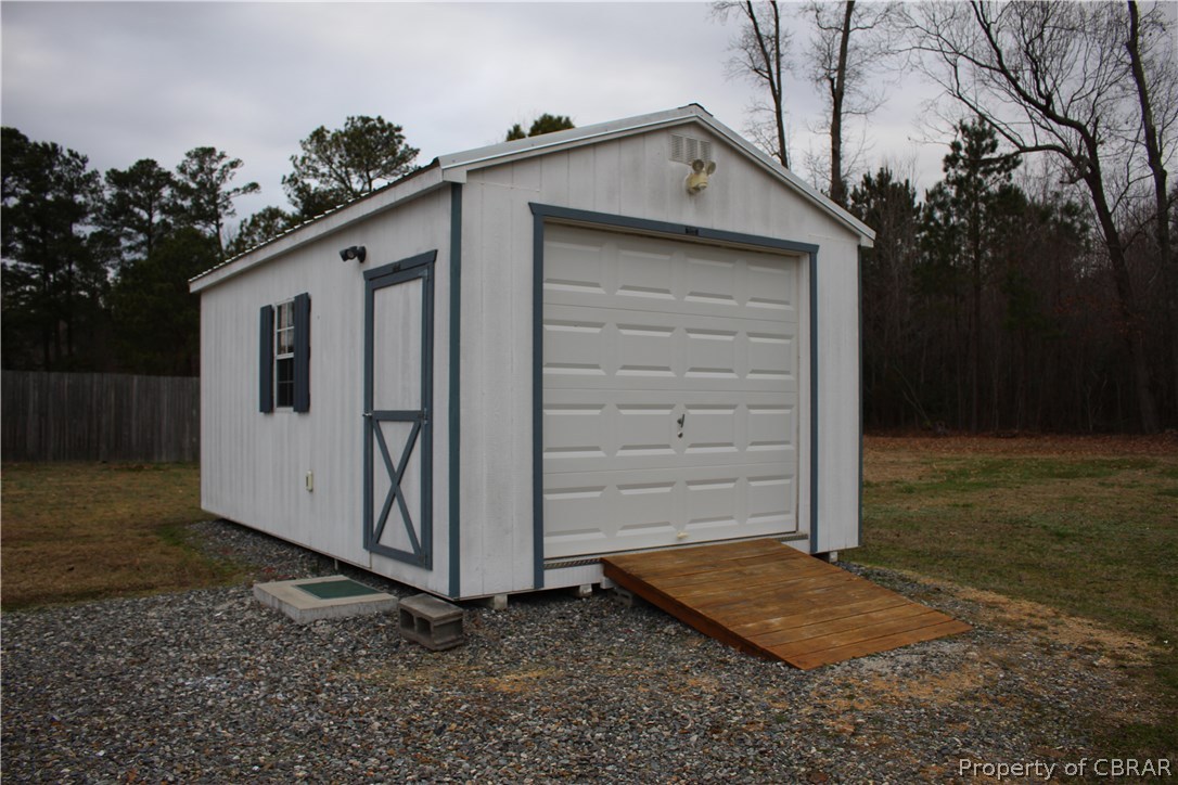 1174 North River Road Bohannon, VA 23021 - Photo 31 of 35 a front view of a house with a yard