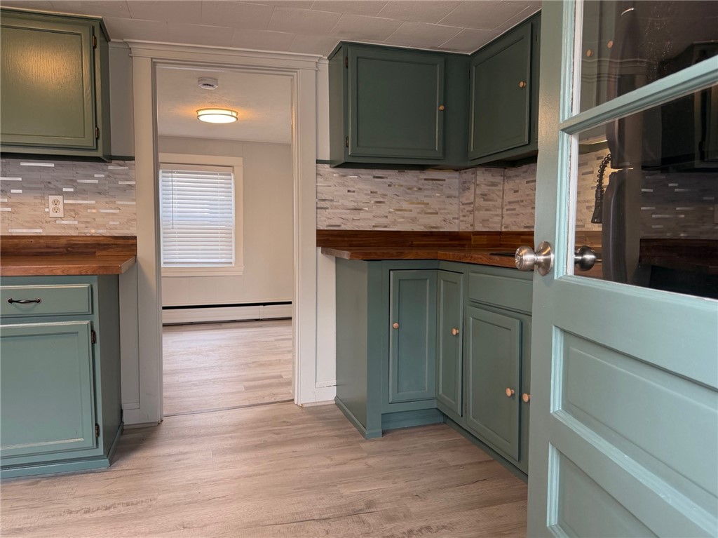 144 Hopkins Hill Road, Unit A Coventry, RI 02816 - Photo 1 of 17 View into Kitchen from Side Entry