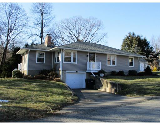 95 Powers Road Holden, MA 01520 - Photo 1 of 29 a front view of a house with a yard