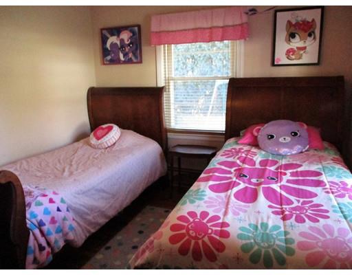 95 Powers Road Holden, MA 01520 - Photo 18 of 29 a bedroom with two beds and a painting on the wall