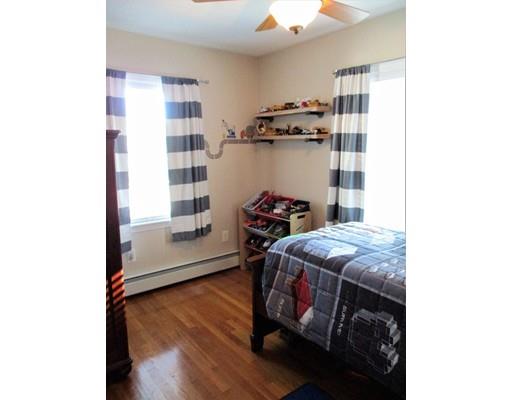 95 Powers Road Holden, MA 01520 - Photo 19 of 29 a bed room with a bed and a window