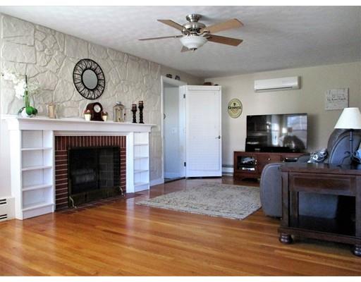 95 Powers Road Holden, MA 01520 - Photo 2 of 29 a living room with furniture and a fireplace