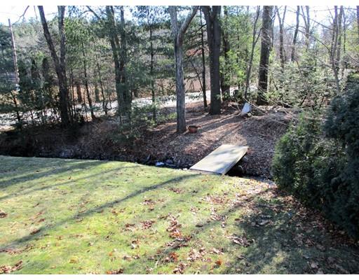 95 Powers Road Holden, MA 01520 - Photo 24 of 29 a view of a backyard with trees