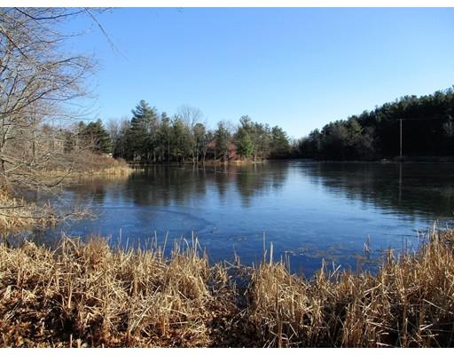 95 Powers Road Holden, MA 01520 - Photo 27 of 29 a view of a lake with houses in the back