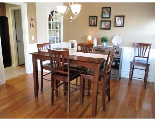 95 Powers Road Holden, MA 01520 - Photo 8 of 29 a view of a dining room with furniture and wooden floor