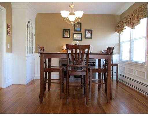 95 Powers Road Holden, MA 01520 - Photo 9 of 29 a view of a dining room with furniture and wooden floor