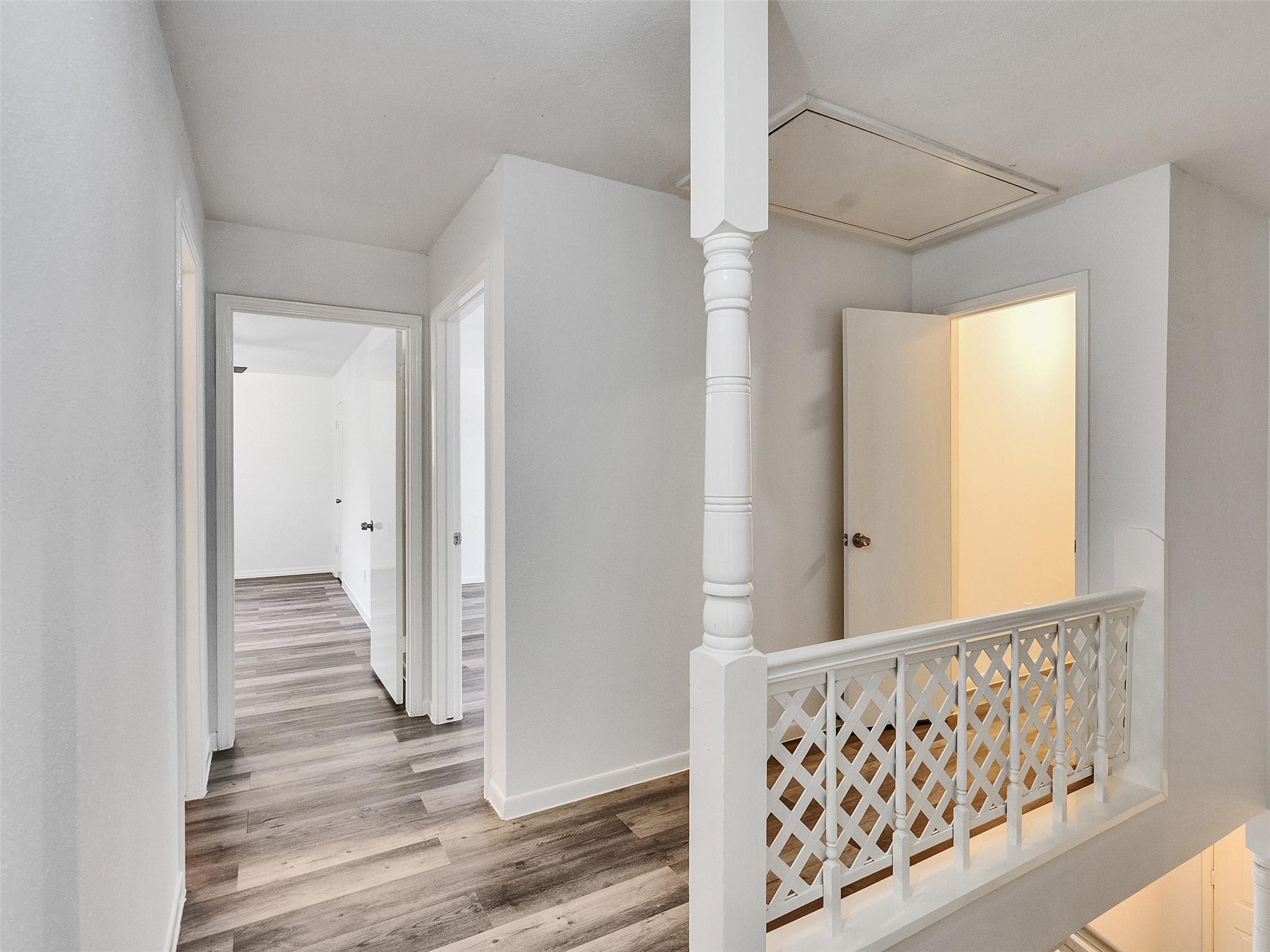 12710 Crow Valley Lane Houston, TX 77099 - Photo 21 of 34 a view of a hallway with wooden floor and entryway