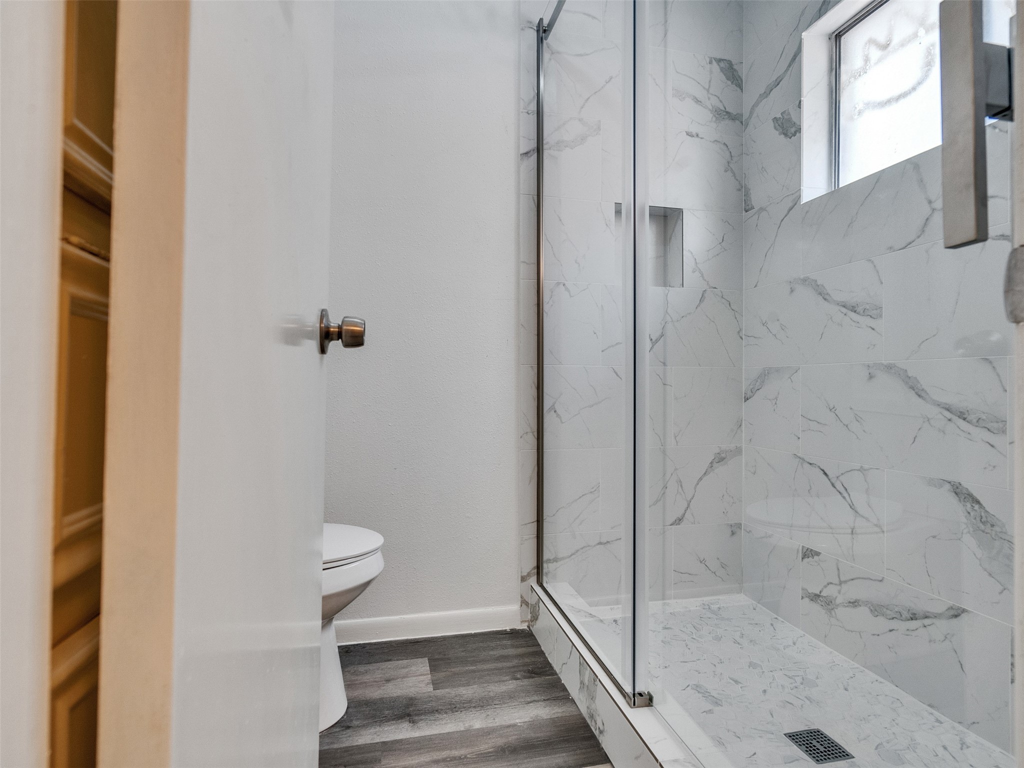 12710 Crow Valley Lane Houston, TX 77099 - Photo 25 of 34 a bathroom with a shower and toilet