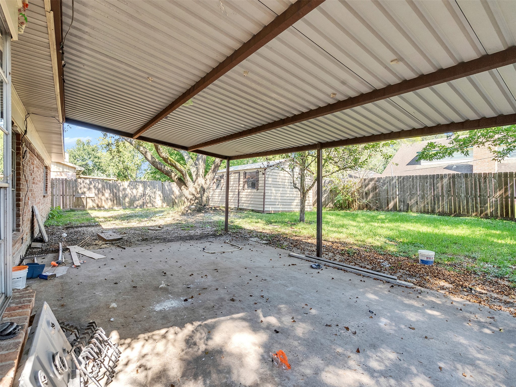 12710 Crow Valley Lane Houston, TX 77099 - Photo 27 of 34 a view of a backyard with plants and backyard