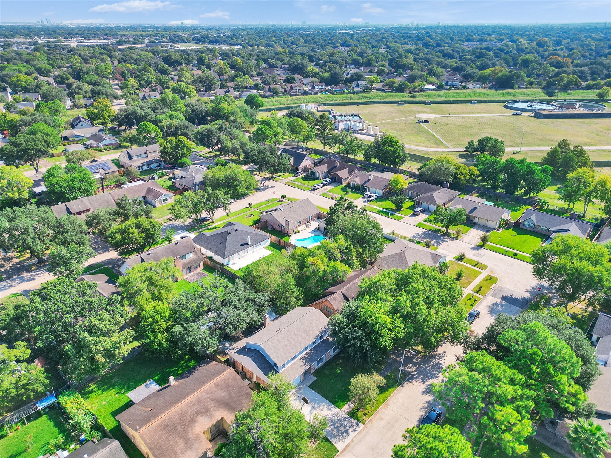 12710 Crow Valley Lane Houston, TX 77099 - Photo 30 of 34 an aerial view of ocean and residential houses with outdoor space