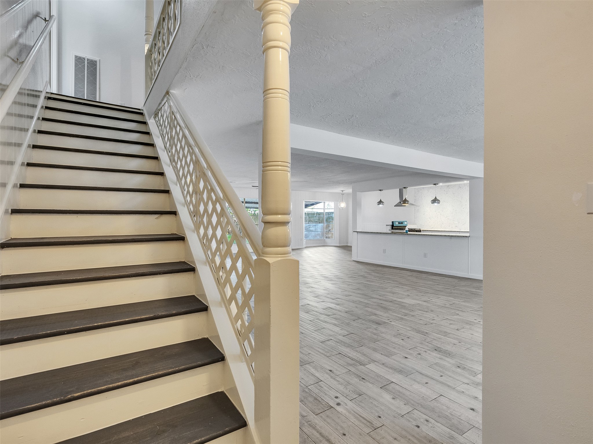 12710 Crow Valley Lane Houston, TX 77099 - Photo 3 of 34 a view of entryway and hall with wooden floor
