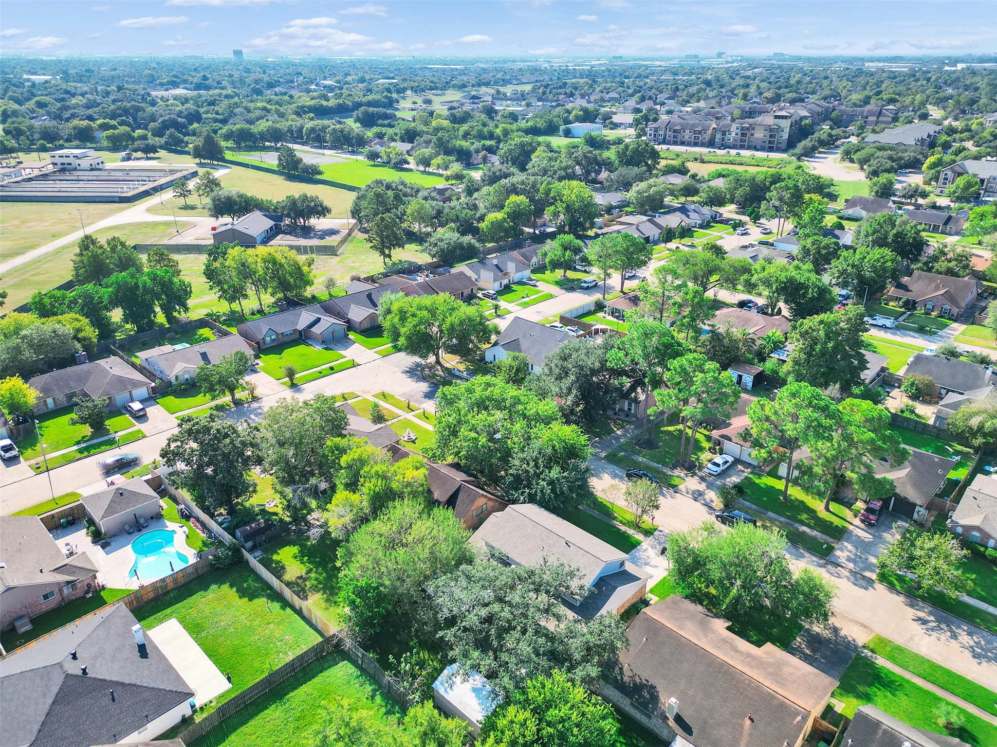 12710 Crow Valley Lane Houston, TX 77099 - Photo 34 of 34 an aerial view of residential houses with outdoor space and trees