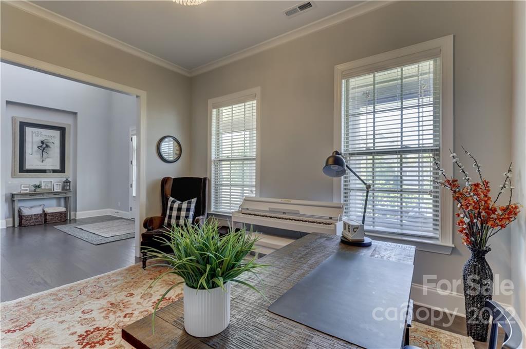5266 Meadowcroft Way Fort Mill, SC 29708 - Photo 12 of 47 a living room with furniture and a potted plant