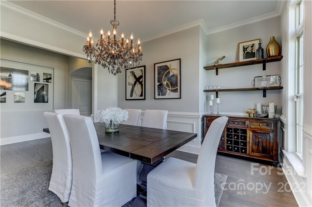 5266 Meadowcroft Way Fort Mill, SC 29708 - Photo 14 of 47 a view of a dining room with furniture and wooden floor