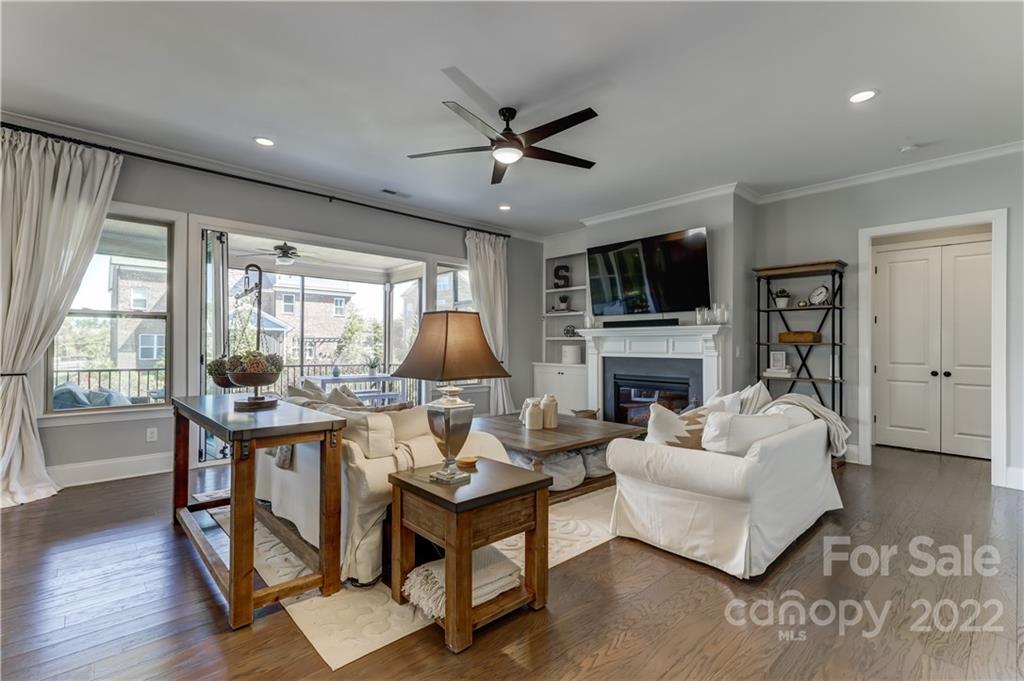 5266 Meadowcroft Way Fort Mill, SC 29708 - Photo 16 of 47 a living room with fireplace furniture and a flat screen tv