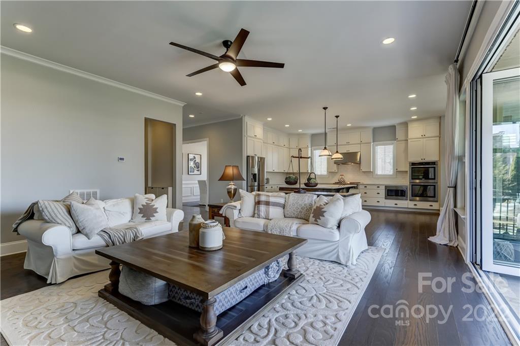 5266 Meadowcroft Way Fort Mill, SC 29708 - Photo 18 of 47 a living room with furniture and kitchen view