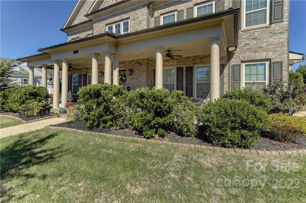 5266 Meadowcroft Way Fort Mill, SC 29708 - Photo 4 of 47 a front view of a house with garden