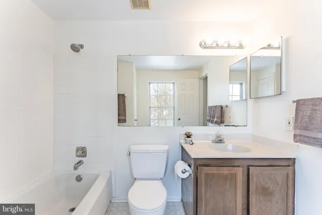 a balcony with a glass door