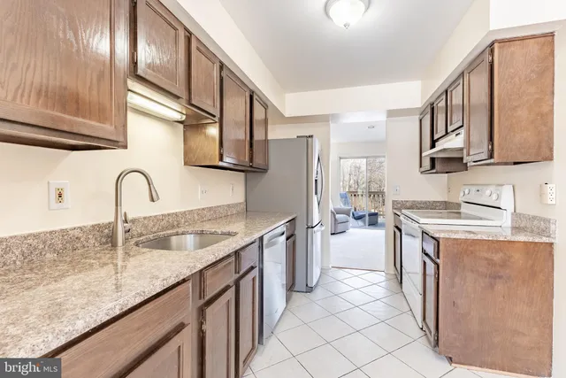 a view of a two chairs on the deck