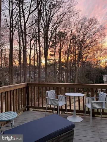 a open kitchen with granite countertop a sink stove and cabinets