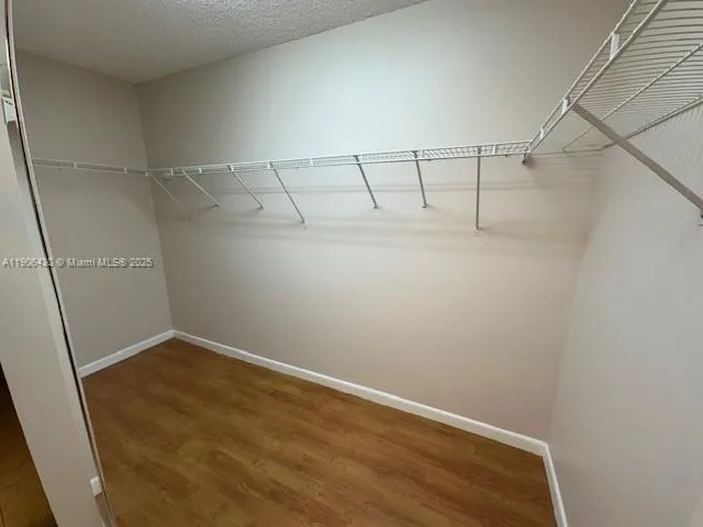 a view of a room with racks on the wall