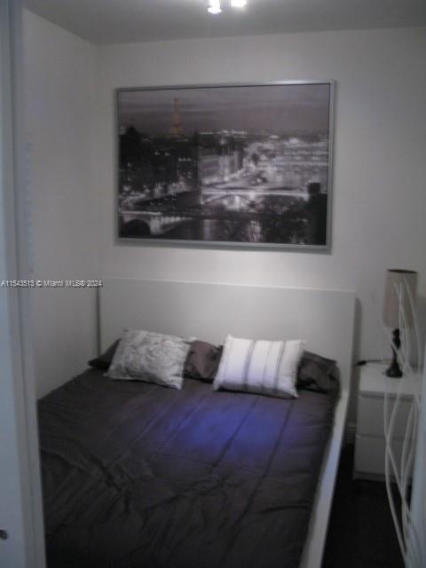 1525 Meridian Avenue, Unit 207 Miami Beach, FL 33139 - Photo 12 of 18 a bedroom with a bed and window