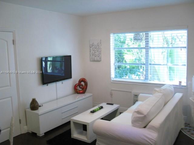 1525 Meridian Avenue, Unit 207 Miami Beach, FL 33139 - Photo 3 of 18 a bedroom with furniture and a window