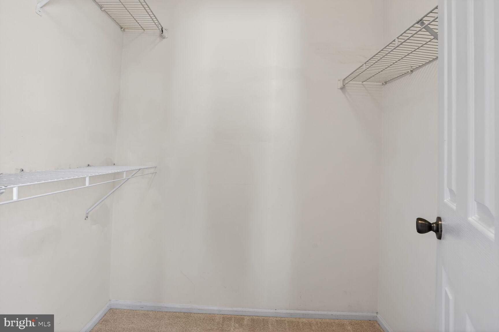 14322 Climbing Rose Way, Unit 306 Centreville, VA 20121 - Photo 15 of 35 a view of small space with racks on the wall