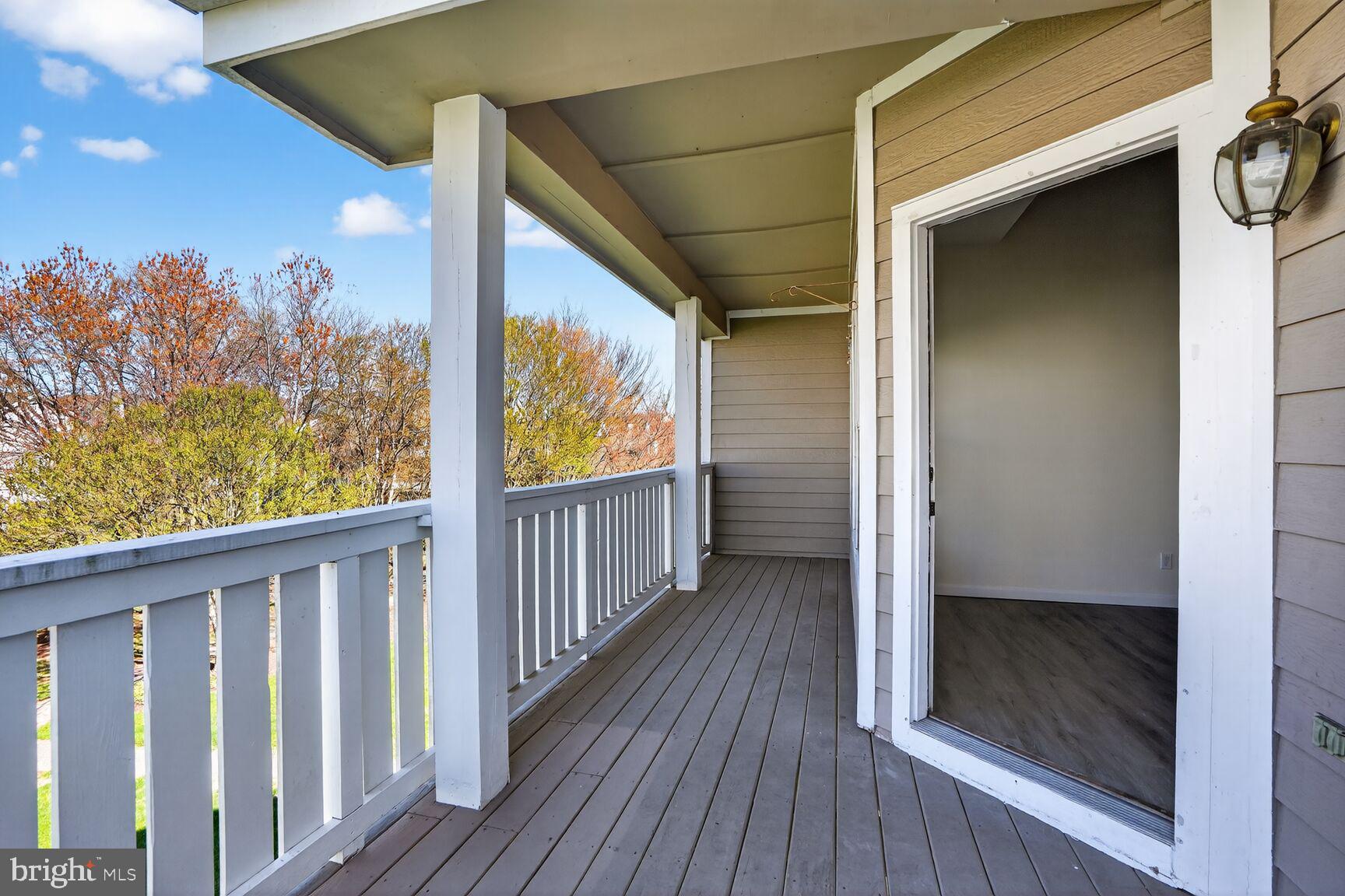 14322 Climbing Rose Way, Unit 306 Centreville, VA 20121 - Photo 23 of 35 a view of a porch