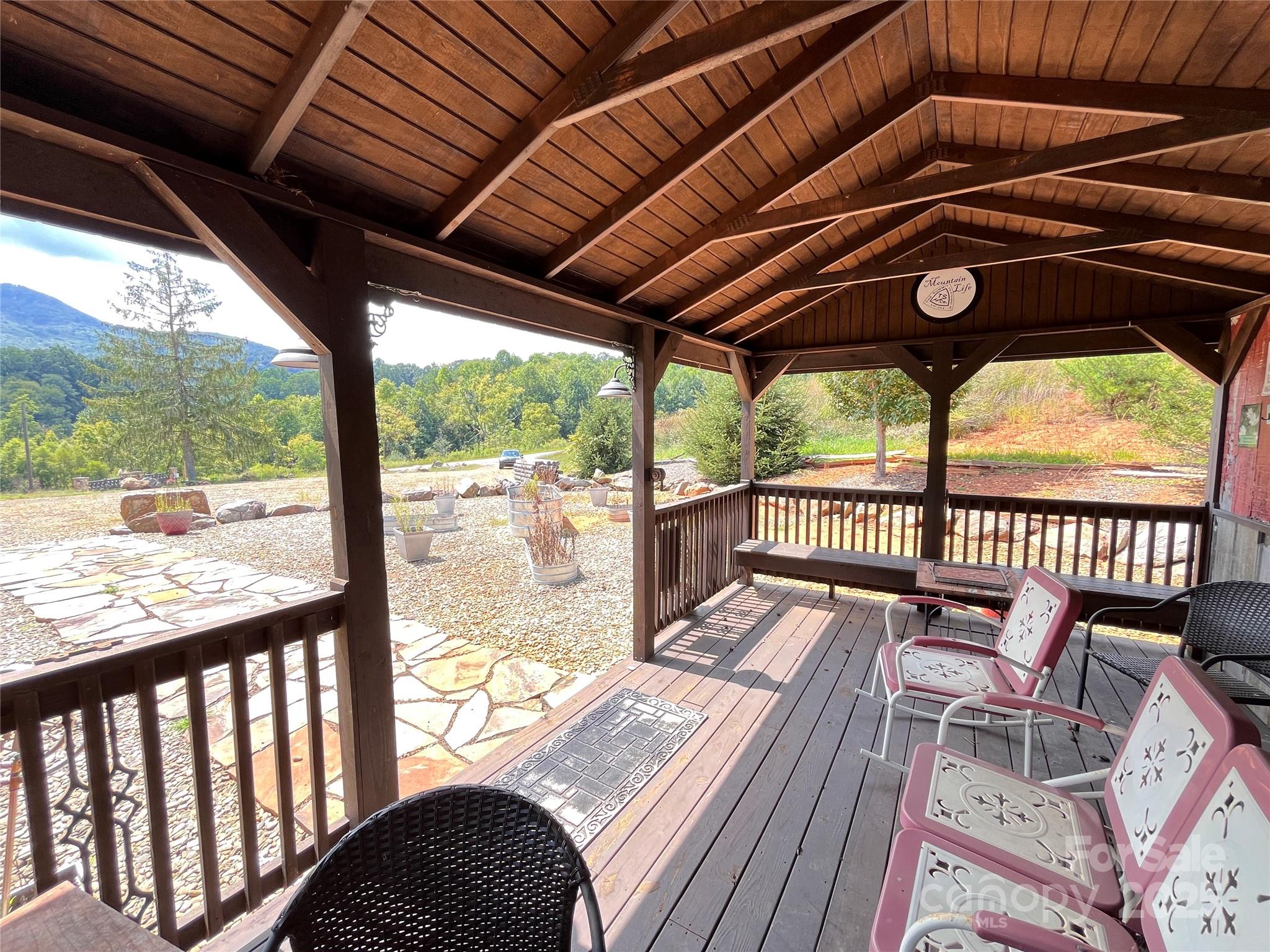 4 Summit View Drive, Unit 4 Candler, NC 28715 - Photo 20 of 23 a view of porch with a seating space