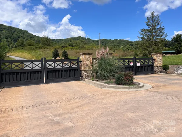 a view of a garden with a building