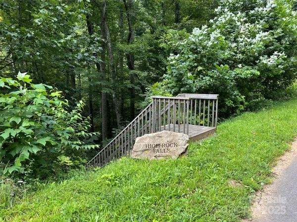 a view of outdoor space with a garden and deck