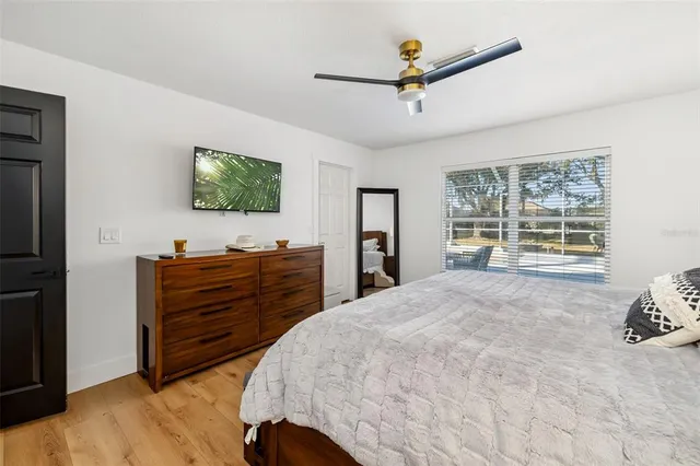 a view of a swimming pool with a lounge chairs