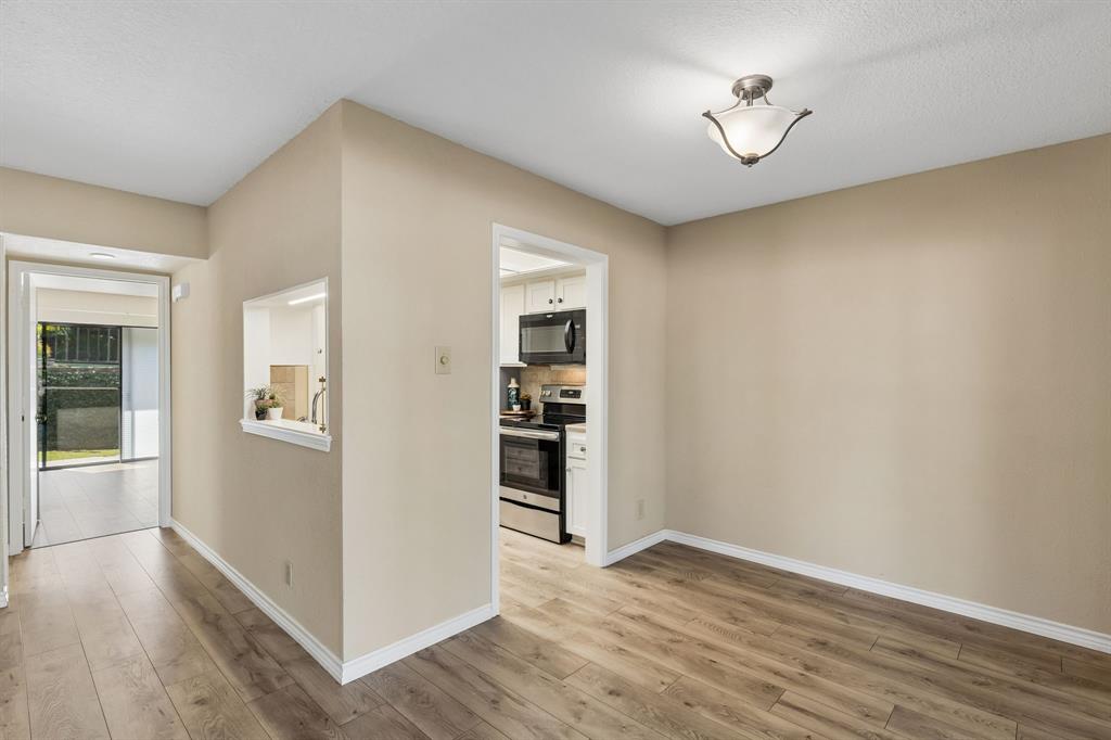 1121 Signal Ridge Place Rockwall, TX 75032 - Photo 9 of 26 Looking into the kitchen