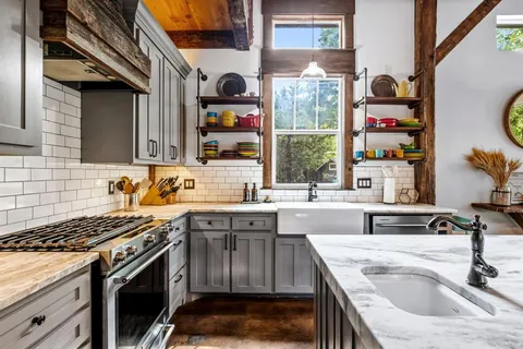 a dining room with large window