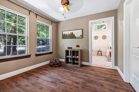 view of a lake with a house in the background