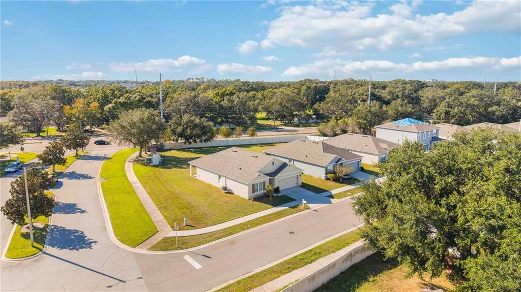 5473 Oro Valley Road Auburndale, FL 33823 - Photo 17 of 17 an aerial view of residential houses with outdoor space and city view