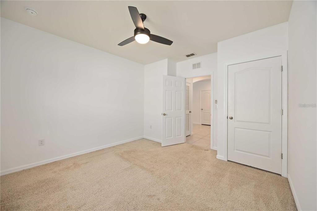 5473 Oro Valley Road Auburndale, FL 33823 - Photo 10 of 17 wooden floor in an empty room