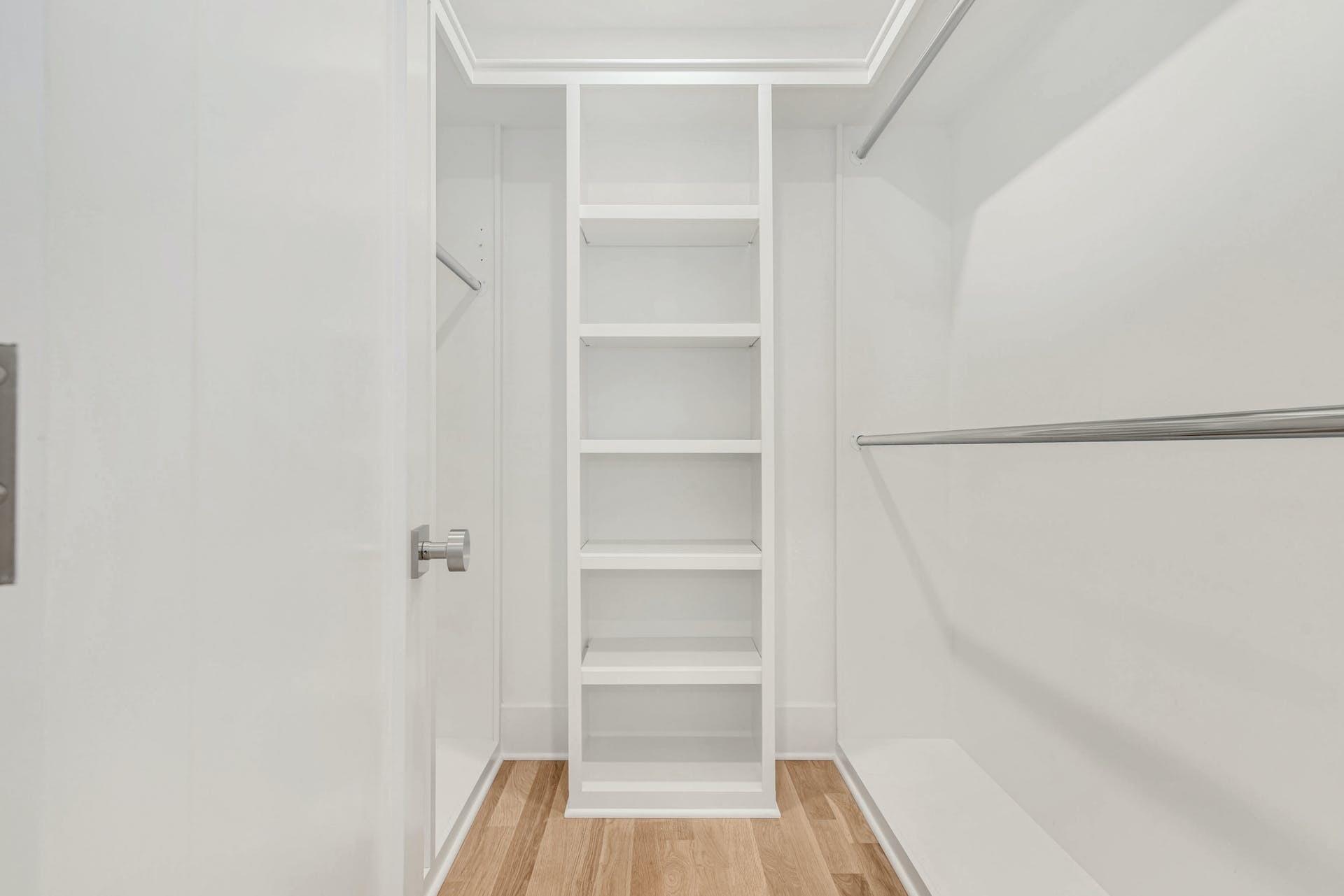 77 Witch Lane Rowayton, CT 06853 - Photo 21 of 39 a view of walk in closet with empty racks