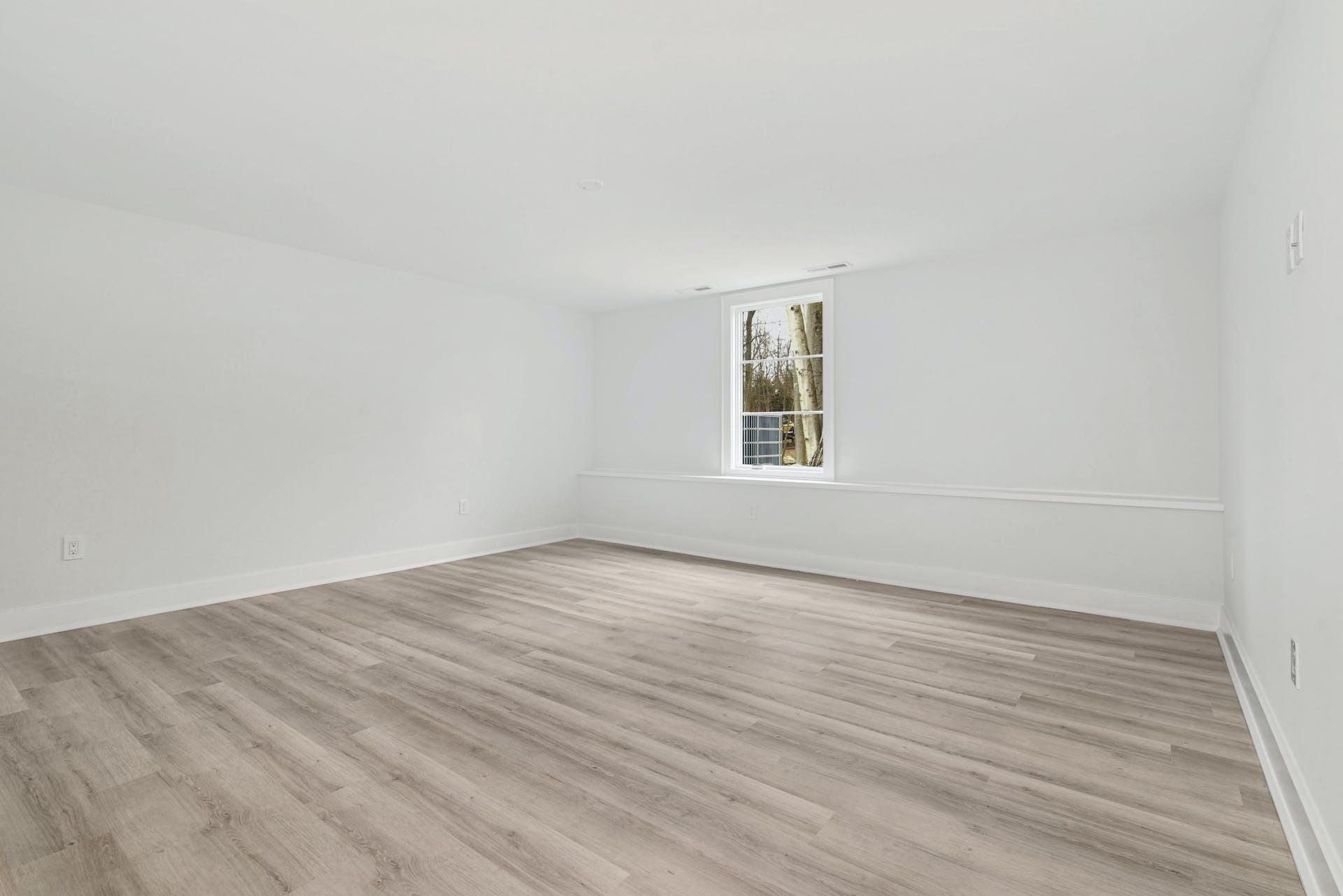 77 Witch Lane Rowayton, CT 06853 - Photo 32 of 39 wooden floor in an empty room