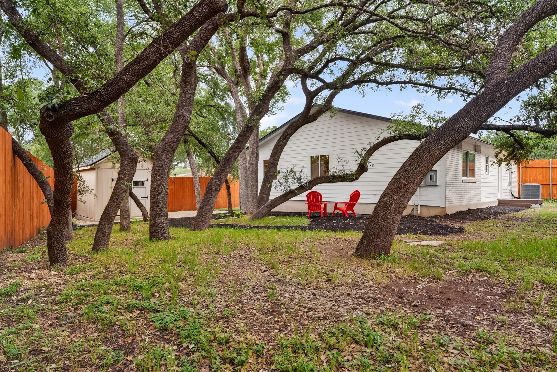 6806 Rearden Road Austin, TX 78745 - Photo 25 of 28 Mature trees providing natural shade in the backyard