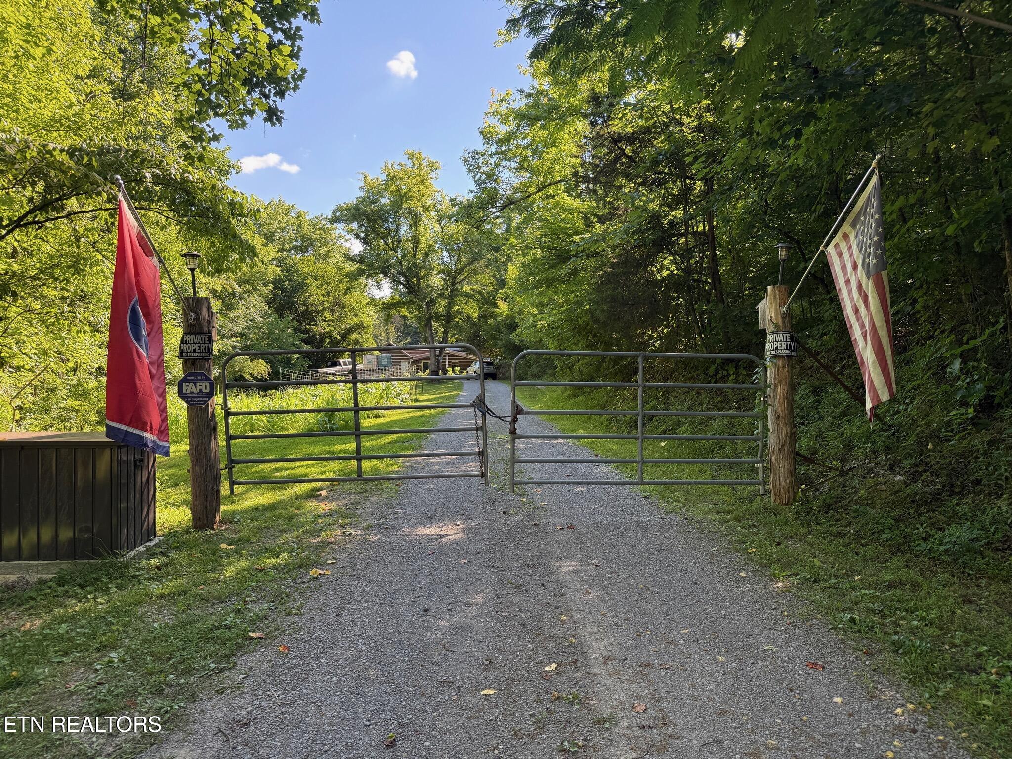 355 Lone Mountain Road Andersonville, TN 37705 - Photo 6 of 45 Gate/Gravel Drive